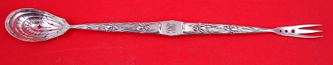 Olive Spoon / Fork combination  w/ iris motif   Rare 10 7/8